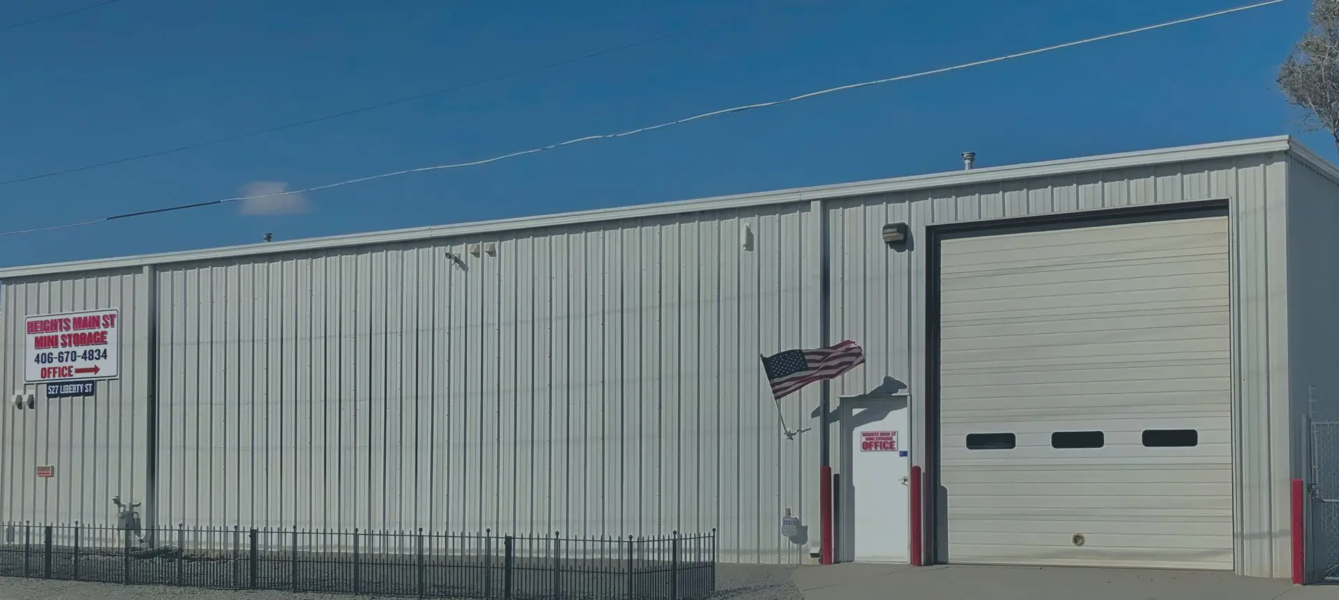 A building with an american flag on the side.