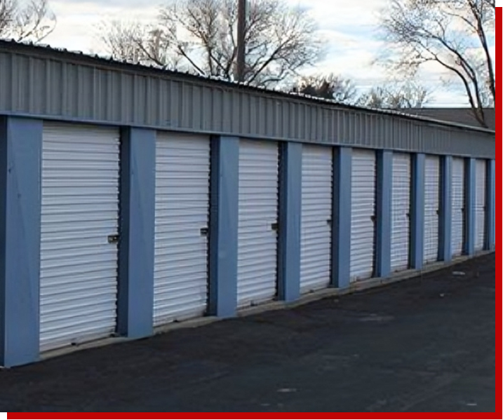 A row of storage units with doors open.